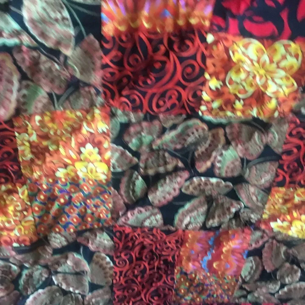 NWT. Hand Crafted Butterflies in Red Quilt